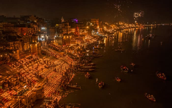 Diwali 2026 India celebration at Varanasi Ghats with thousands of illuminated diyas and boats on the Ganges