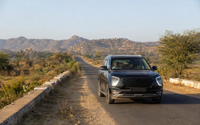 Private car traveling on a Rajasthan road
